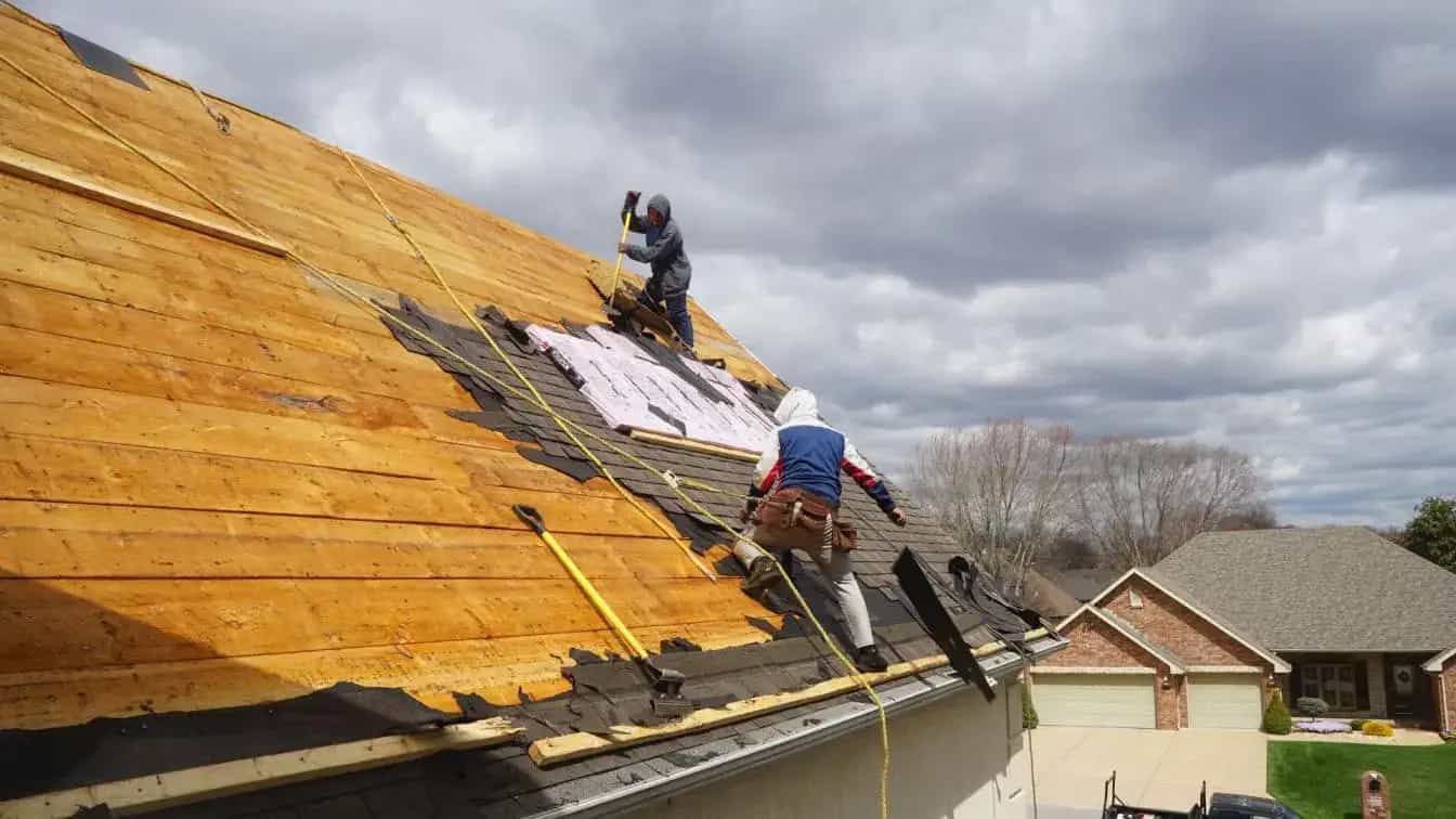 Roofing crew on a residential roof — TOP 1 Expert Home Improvement